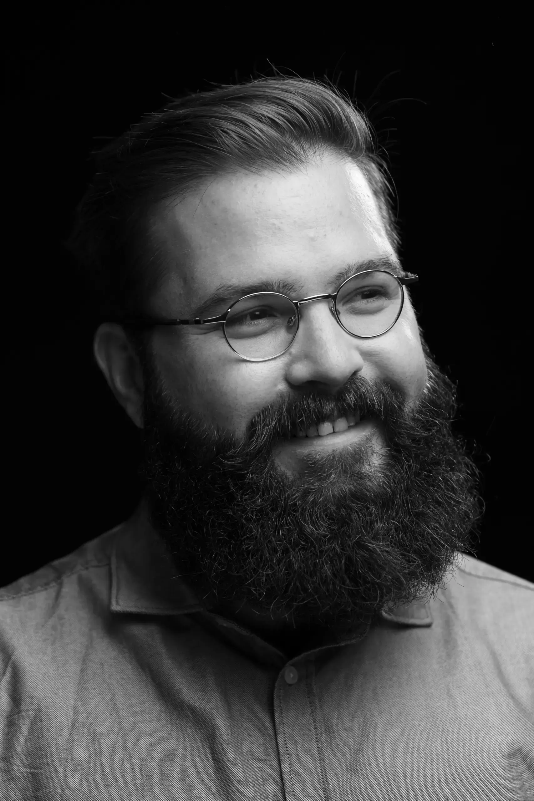 Portrait eines lächelnden Mannes mit Vollbart, Verve Ventures