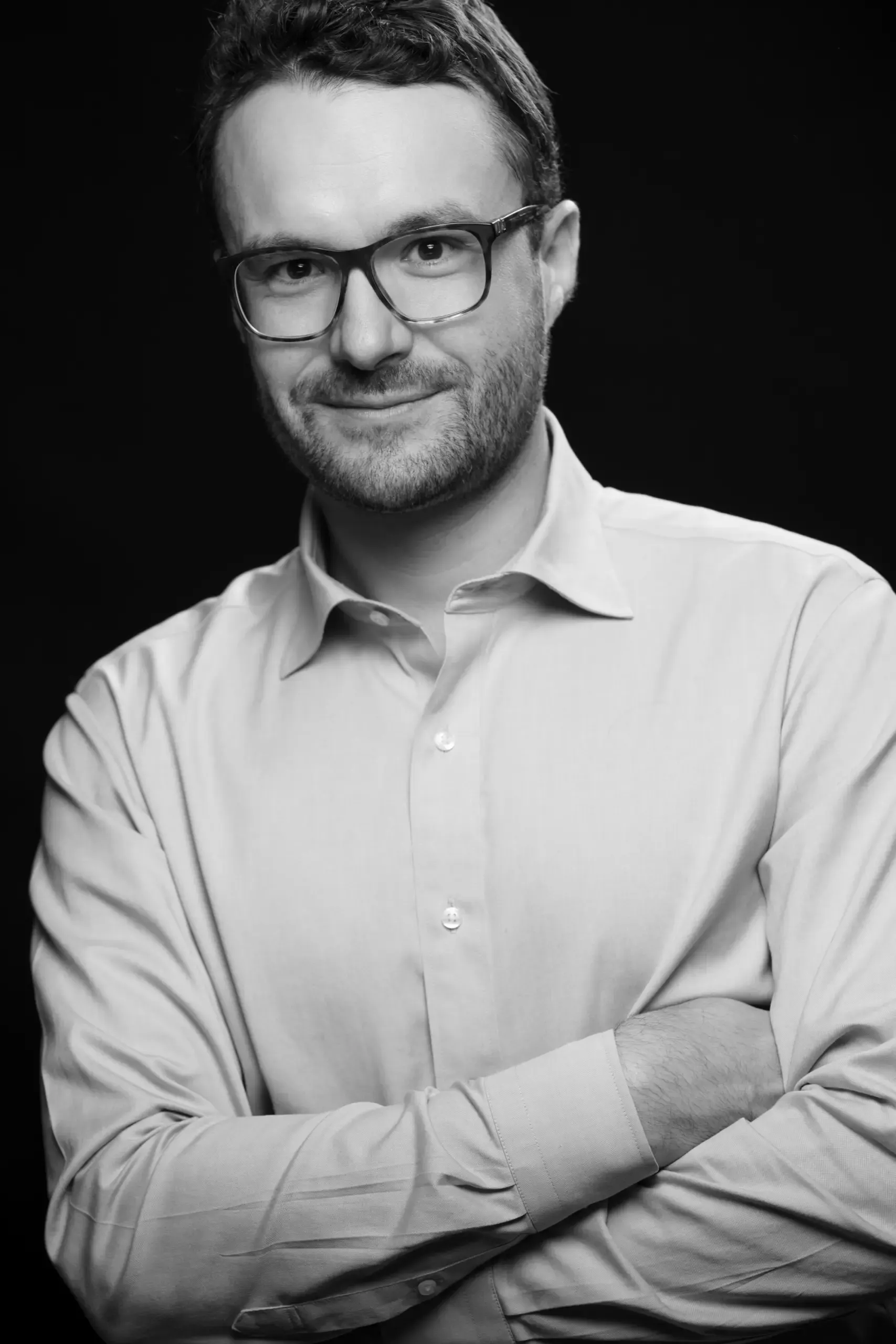 Portrait eines lächelnden Mannes mit Brille, Verve Ventures